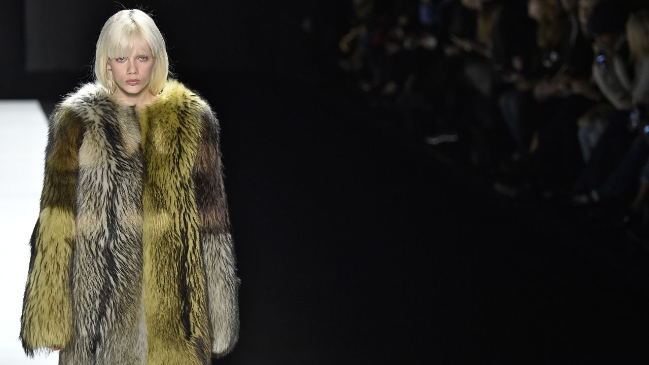 A model shows off a furry coat at the Vera Wang fall/winter 2016 fashion show. Wang's glamorous evening wear has been worn by everyone from Sandra Bullock to Michelle Obama.