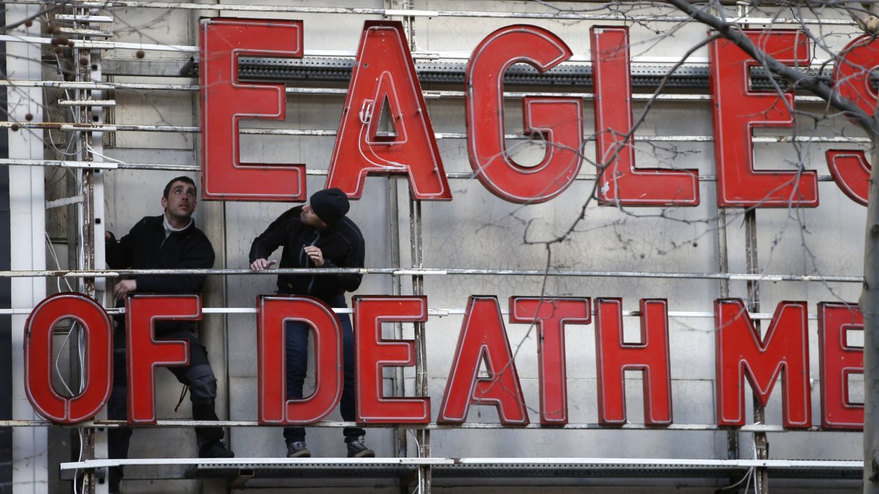 Workers at the Olympia, a concert hall in Paris, install letters to promote the Eagles of Death Metal on Tuesday, February 16. The band <a href="http://www.cnn.com/2016/02/16/europe/eagles-of-death-metal-paris-return/" target="_blank">returned to the French capital</a> three months after terrorists attacked their concert, killing 89 people. 