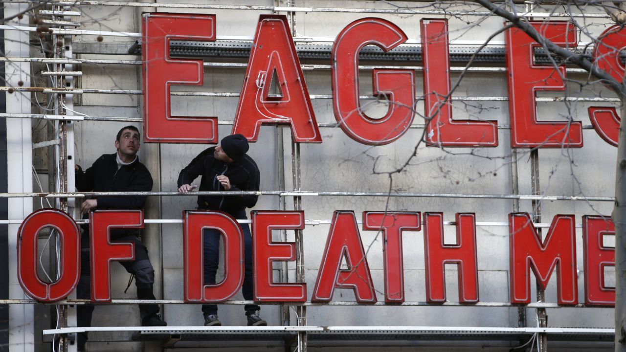 Workers at the Olympia, a concert hall in Paris, install letters to promote the Eagles of Death Metal on Tuesday, February 16. The band <a href="http://www.cnn.com/2016/02/16/europe/eagles-of-death-metal-paris-return/" target="_blank">returned to the French capital</a> three months after terrorists attacked their concert, killing 89 people.