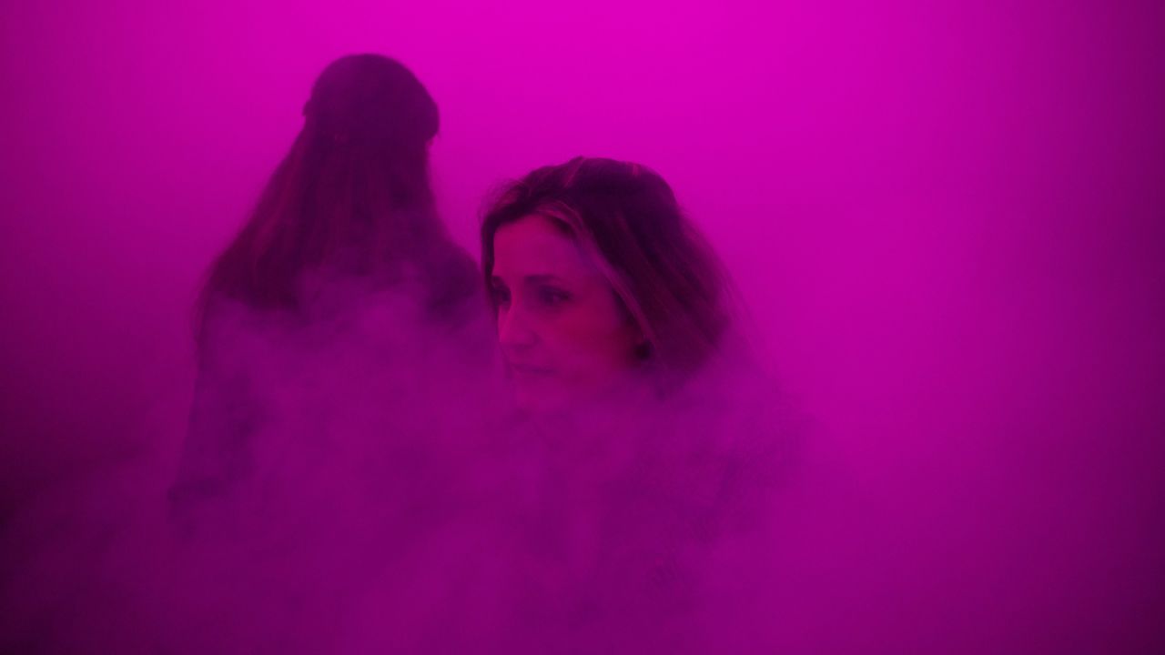 People in Barcelona, Spain, attend a light show in the courtyard of the Picasso Museum on Friday, February 12.