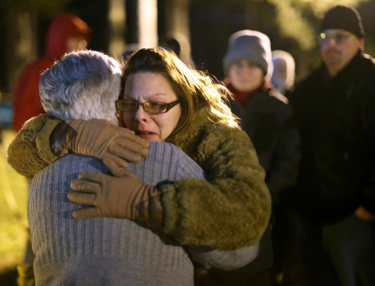 Anita Hunt, a family friend of Travis Clinton Hittson, hugs Hittson's mother, left, after he was executed Wednesday, February 17, in Jackson, Georgia. Hittson had been convicted in the April 1992 killing of Conway Utterbeck.