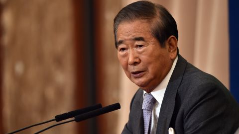 Former Japanese parliament member Shintaro Ishihara speaks to the media at the national press club in Tokyo on December 16, 2014.