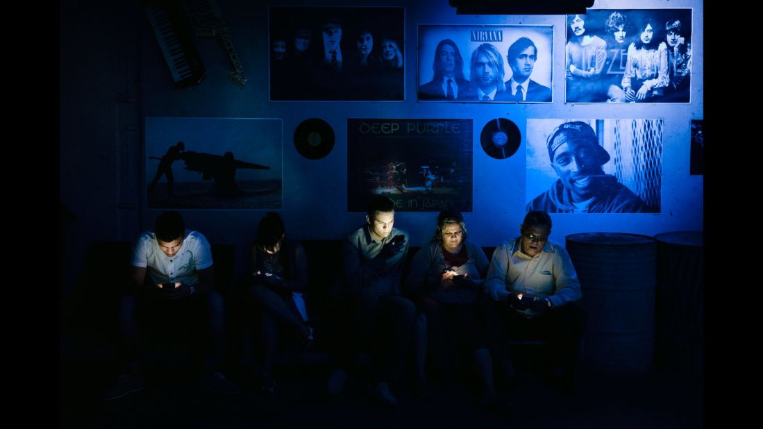 People explore the Internet at a new cultural center in Havana.