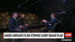 Andy Scholes talks with Kevin Plank & Steph Curry_00011930.jpg