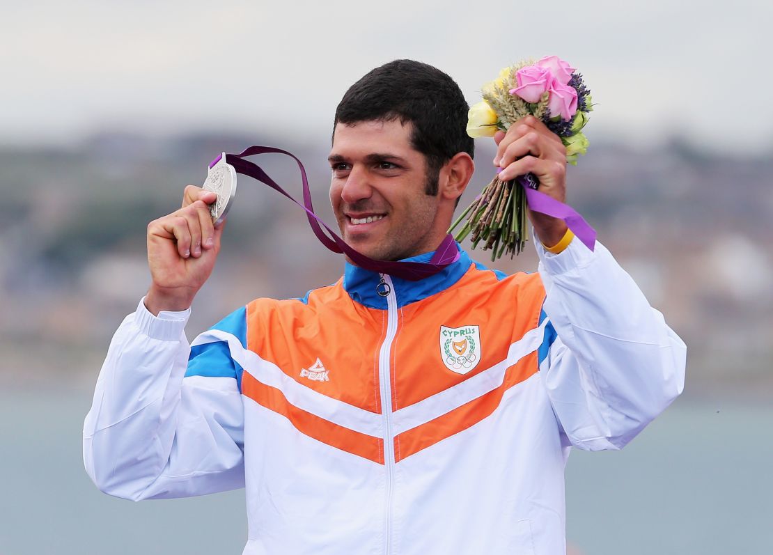 Pavlos Kontides celebrates winning the silver medal in the Men's Laser Class at the 2012 Olympics.