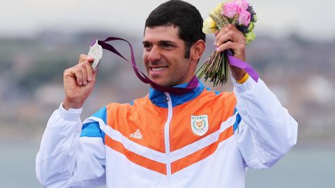 Pavlos Kontides celebrates winning the silver medal in the Men's Laser Class at the 2012 Olympics.