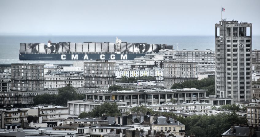 <em>Women Are Heroes, Elizabeth Kamanga on sea, Le Havre,</em> France, 2014, JR