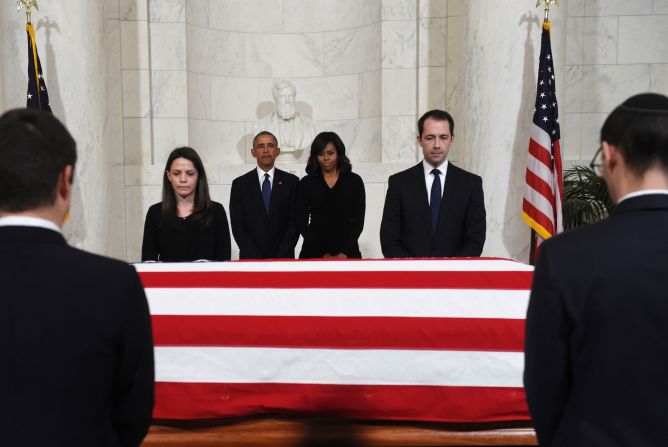 U.S. President Barack Obama and first lady Michelle Obama pay their respects as the body of Supreme Court Justice Antonin Scalia <a href="index.php?page=&url=http%3A%2F%2Fwww.cnn.com%2F2016%2F02%2F19%2Fpolitics%2Fsupreme-court-antonin-scalia-memorial%2Findex.html" target="_blank">lies in repose</a> on Friday, February 19. 