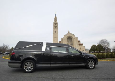 The hearse carrying Scalia's casket arrives at the Basilica of the National Shrine of the Immaculate Conception in Washington on February 20.