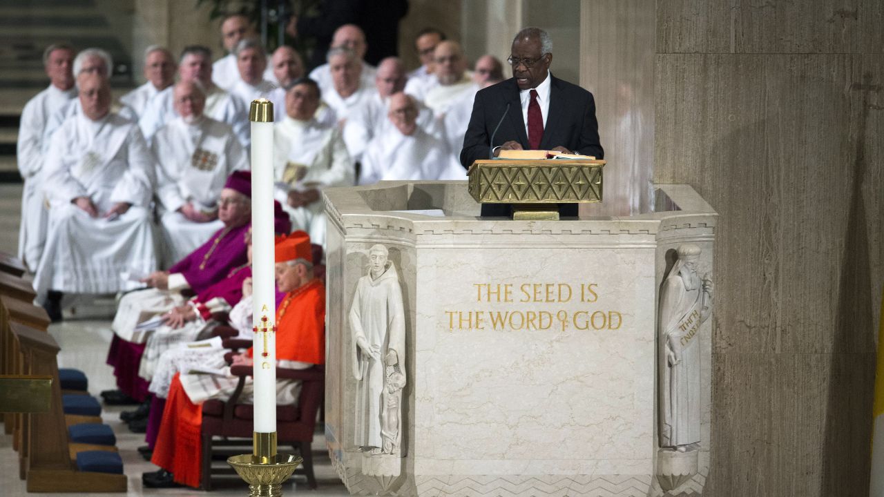Justice Clarence Thomas makes a reading during the funeral Mass for Associate Justice Antonin Scalia at the Basilica of the National Shrine of the Immaculate Conception in Washington, DC.  