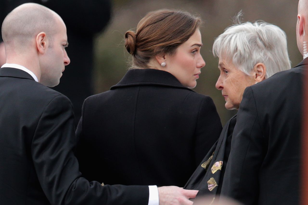 Maureen Scalia, right, arrives for the funeral for her husband on February 20. 