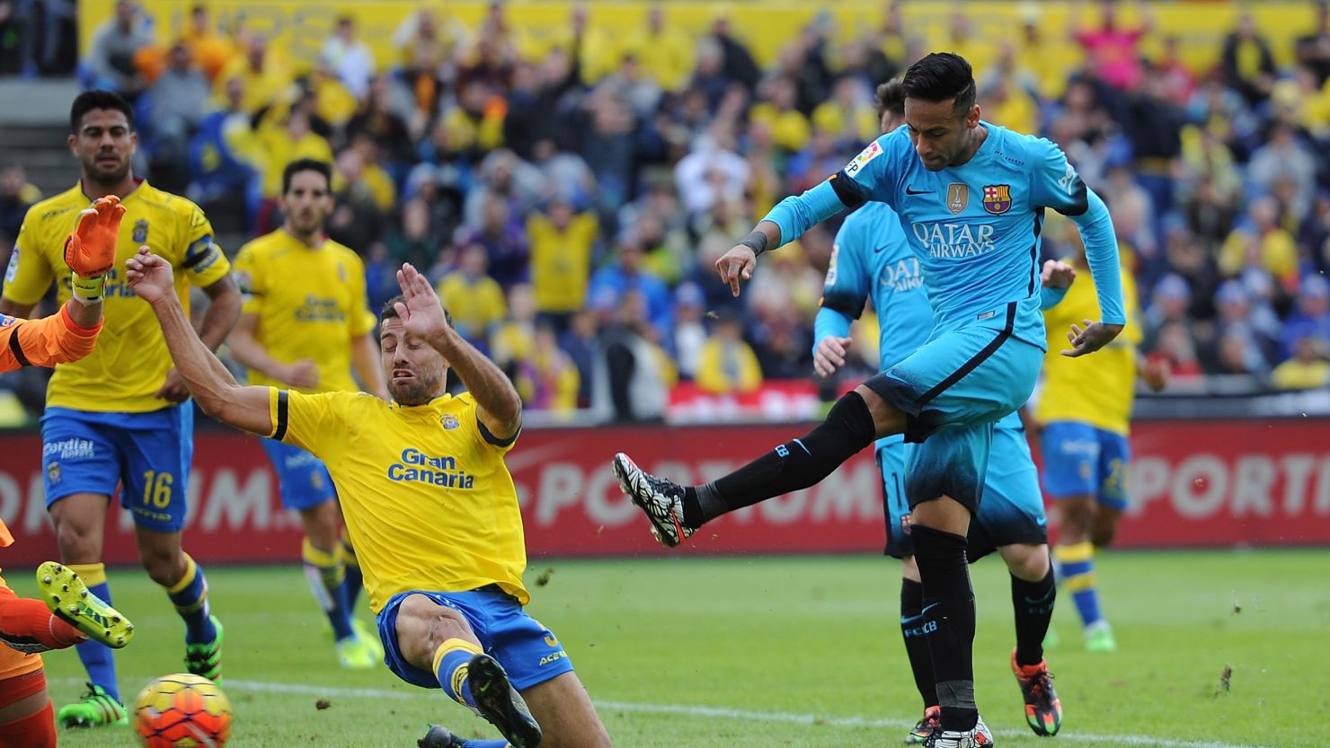 Neymar strikes home Barcelona's second goal in the 2-1 win at Las Palmas in the Estadio Gran Canaria.