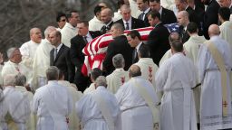 WASHINGTON, DC - FEBRUARY 20:  U.S. Supreme Court Police pallbearers carry Associate Justice Antonin Scalia's flag-covered casket between rows of Catholic clergy and out of the Basilica of the National Shrine of the Immaculate Conception following his funeral February 20, 2016 in Washington, DC. Scalia, who died February 13 while on a hunting trip in Texas, layed in repose in the Great Hall of the Supreme Court on Friday and his funeral service will be at the basillica today.  (Photo by Chip Somodevilla/Getty Images