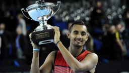 Australia's Nick Kyrgios poses with the trophy after winning the ATP Marseille Open 13 tournament with a straight sets win over Marin Cilic of Croatia.