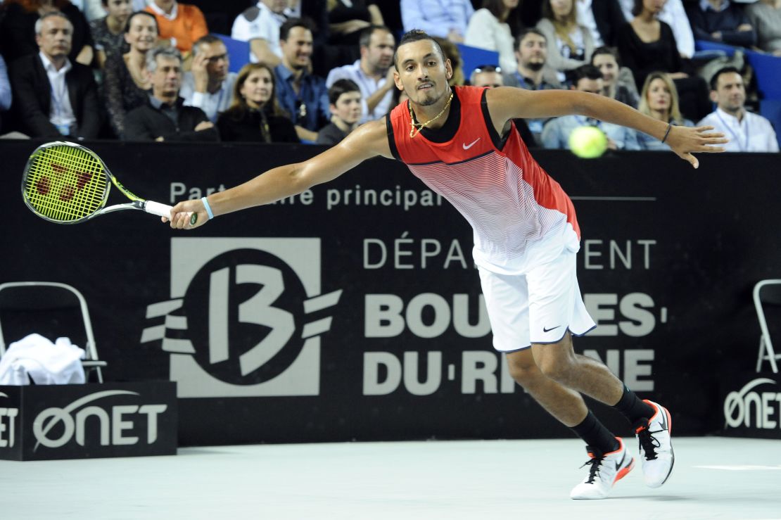 Krygios at full stretch during his straights sets win over Cilic to claim his first ATP title.