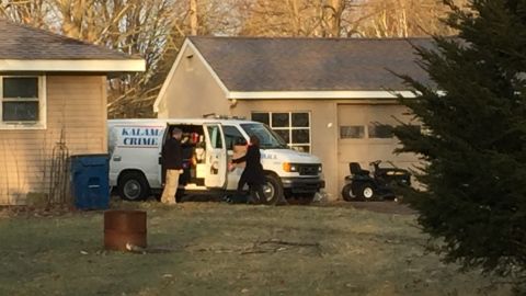 The Kalamazoo County sheriff removes items from Jason Brian Dalton's home.