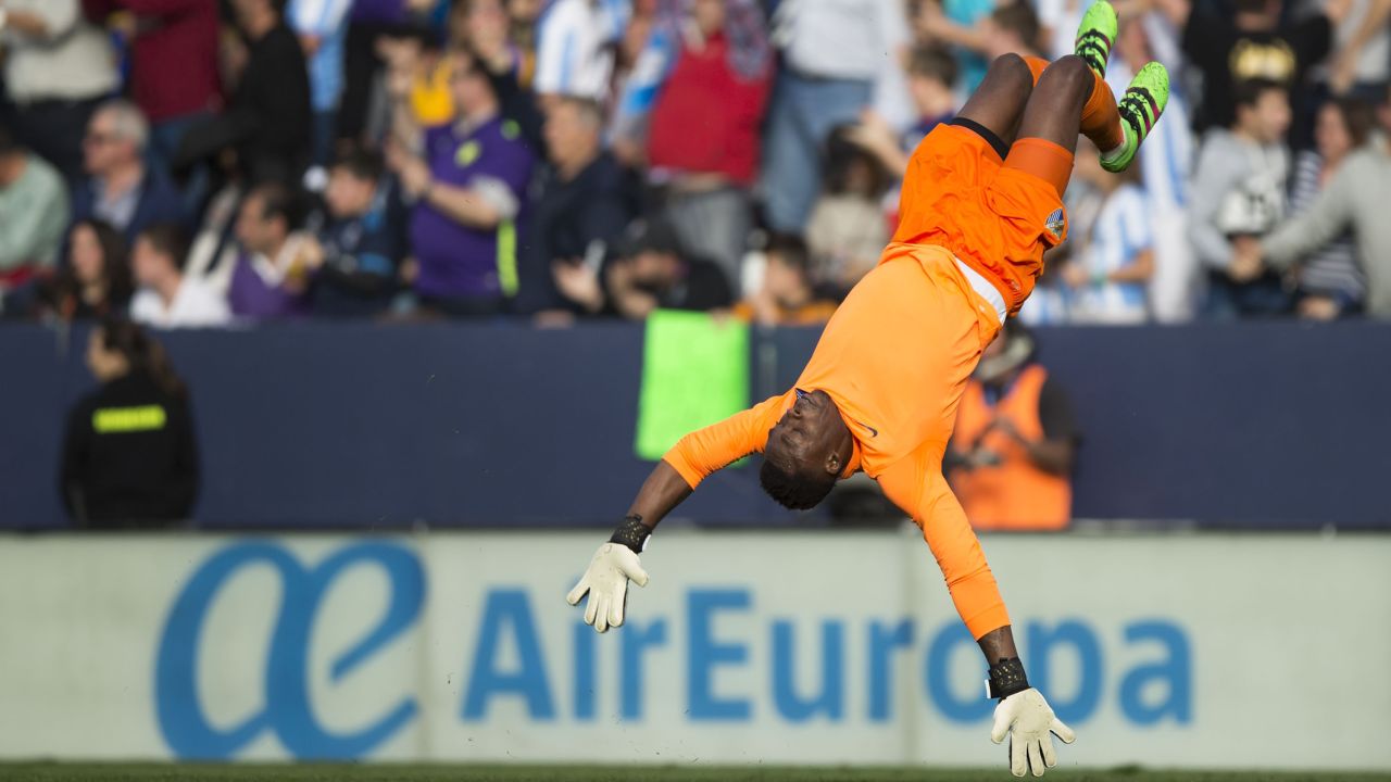 Goalkeeper Carlos Kameni saved Ronaldo's penalty and then celebrated the Malaga equalizer in the second half at La Rosaleda Stadium.