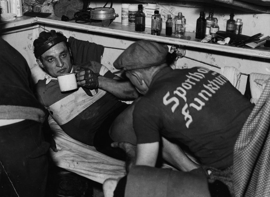 Six-day races used to be even more grueling affairs and here Italian Olympic cyclist Severino Rigoni takes a rare break during the 1949 Berlin competition. 