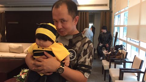 When Bookko is busy, others help out with childcare.