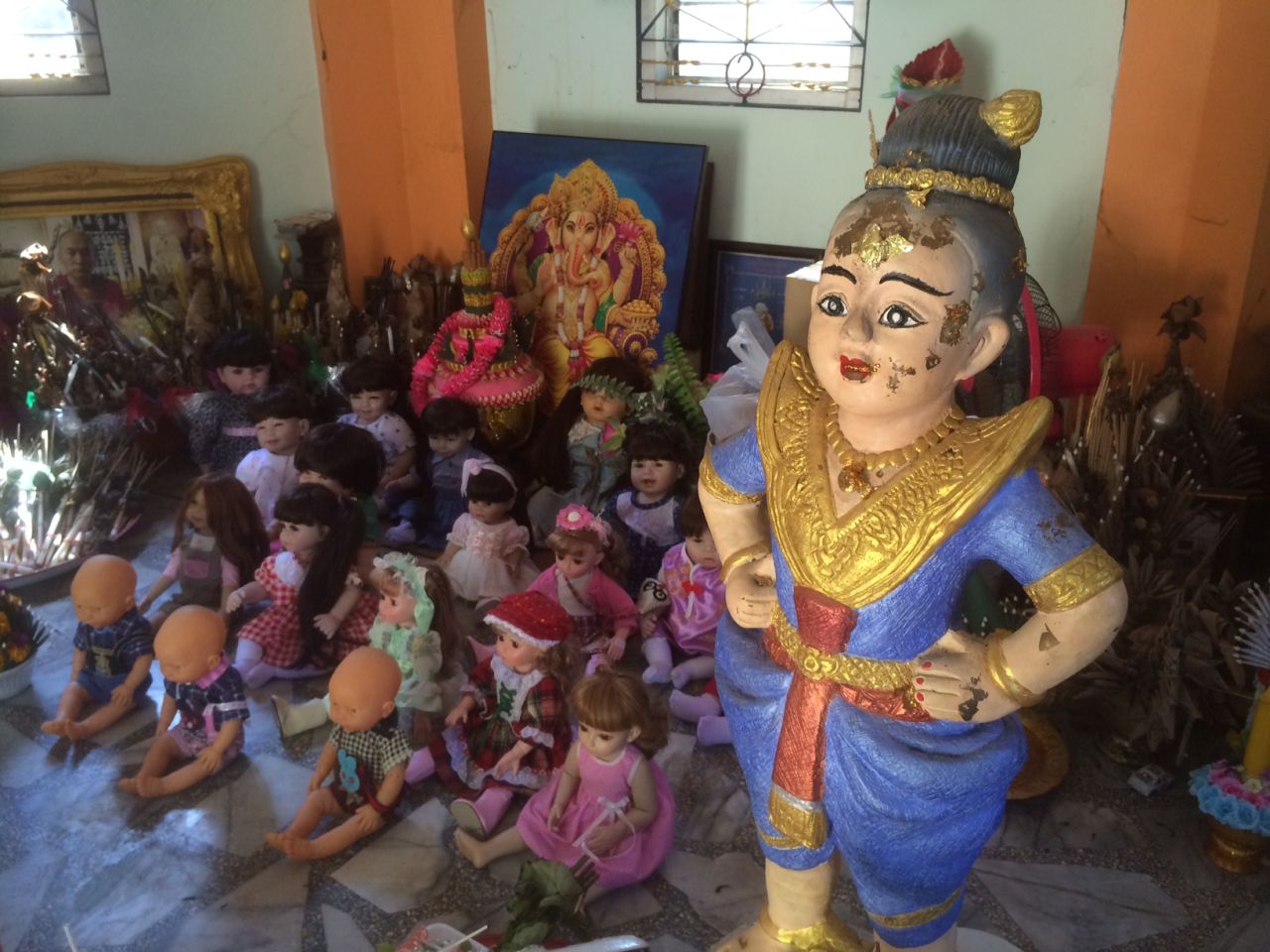 Many dolls have been brought here to the temple, where they can be shown due respect. 