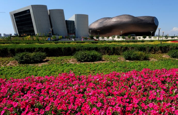 The city of Ordos is commonly referred to as a "Ghost Town" due to its lack of people. Here is a view of the City Library and the Ordos Museum building. 