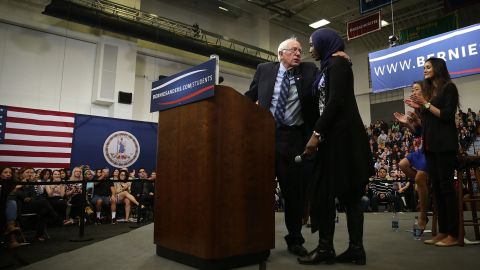 Sanders embraces Muslim student Remaz Abdelgader during an event at George Mason University in Fairfax, Virginia, on October 28. Asked what he would do about Islamophobia in the United States, Sanders said he was determined to fight racism and "build a nation in which we all stand together as one people."