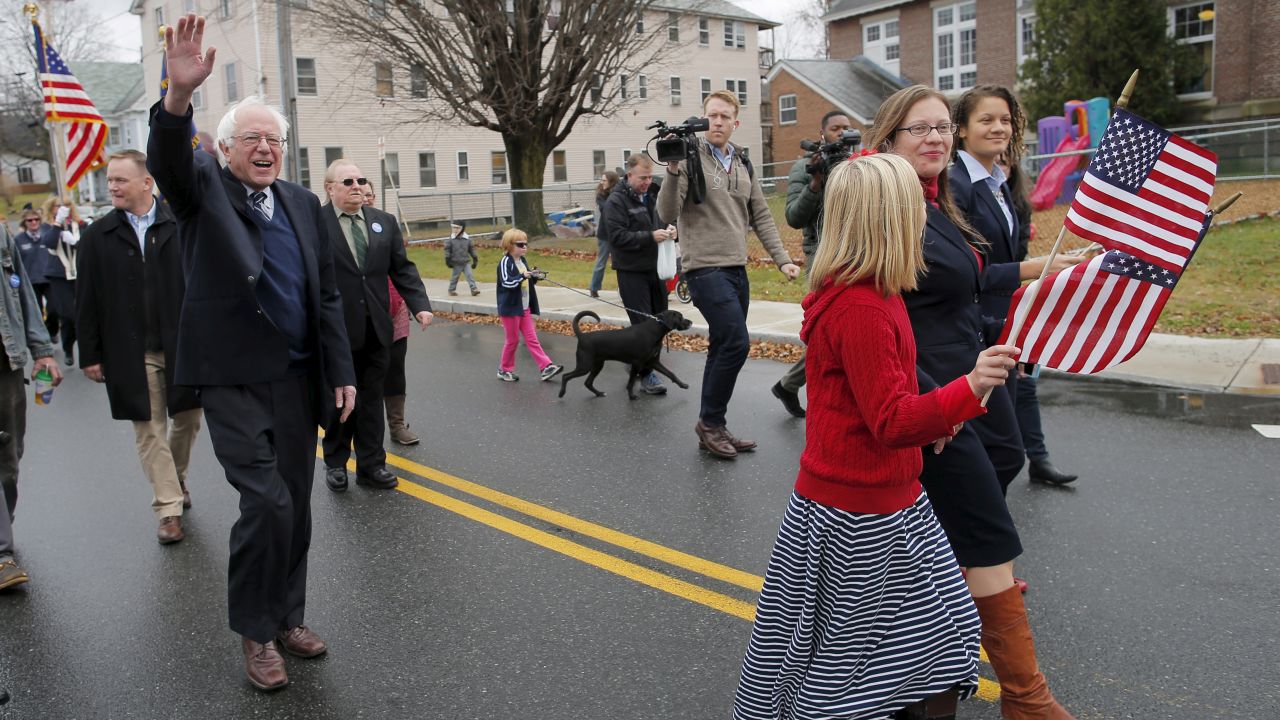 Sanders waves while walking in a Veterans Day parade in Lebanon, New Hampshire, in November 2015.