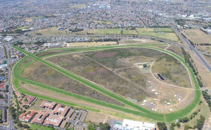 Kenilworth Racecourse and the conservation area, as seen from above. The fynbos in the Western Cape is more botanically diverse than the tropical rainforests of South America,<a href="index.php?page=&url=http%3A%2F%2Fwwf.panda.org%2Fwhat_we_do%2Fwhere_we_work%2Ffynbos%2F" target="_blank" target="_blank"> according to the WWF</a>.   