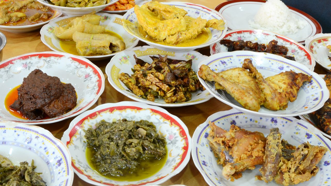 Nasi padang is a feast of dozen dishes stacked up on your table, tp go with a plate of steamed rice. Back off, Singapore. It's ours. 