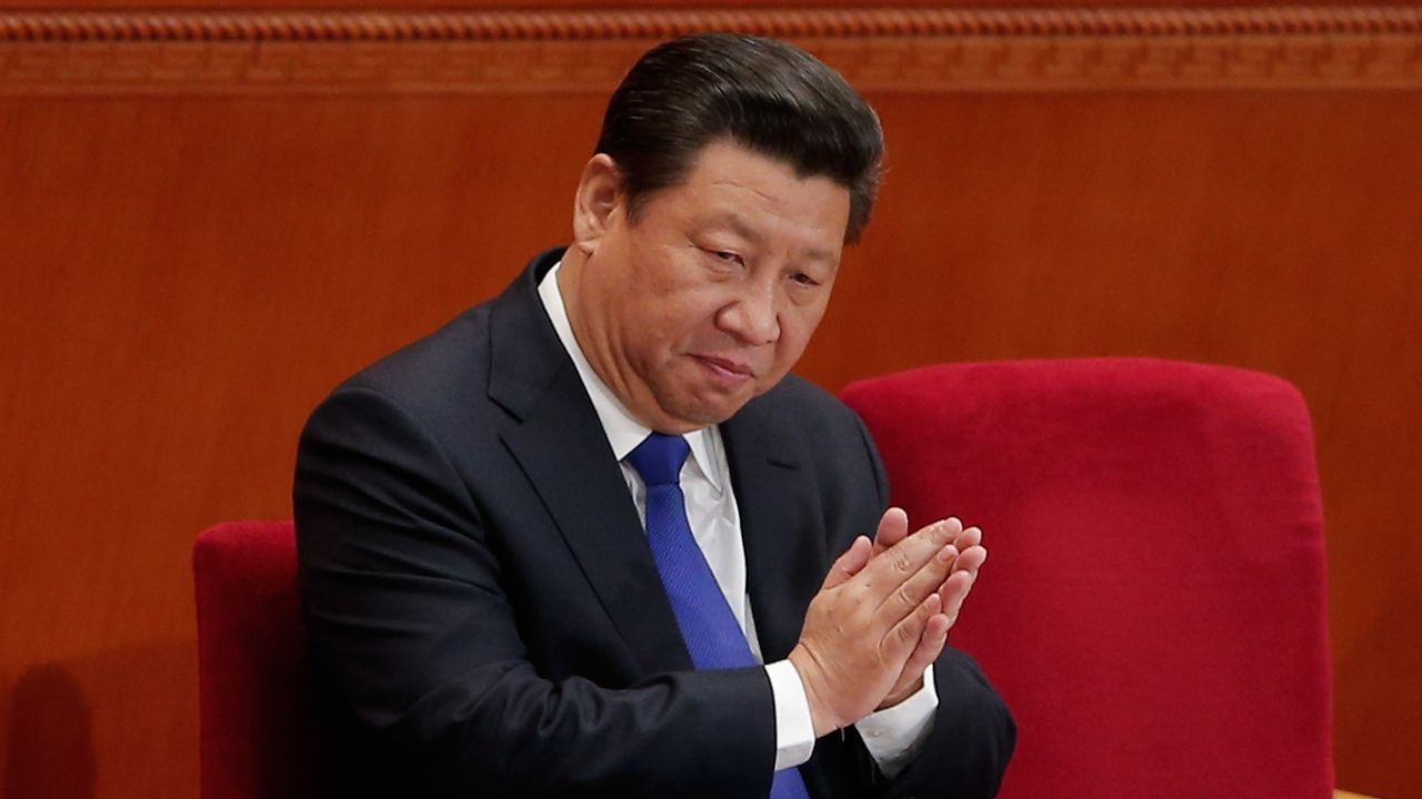 BEIJING, CHINA - MARCH 05:  Chinese President Xi Jinping applauds during the opening of the 3rd Session of the 12th National People's Congress at the Great Hall of the People on March 5, 2015 in Beijing, China. The government work report presented:  the main targets of economic and social development; a projected 2015 GDP growth of about 7 percent; and consumer prices rising about 3 percent.  (Photo by Lintao Zhang/Getty Images)