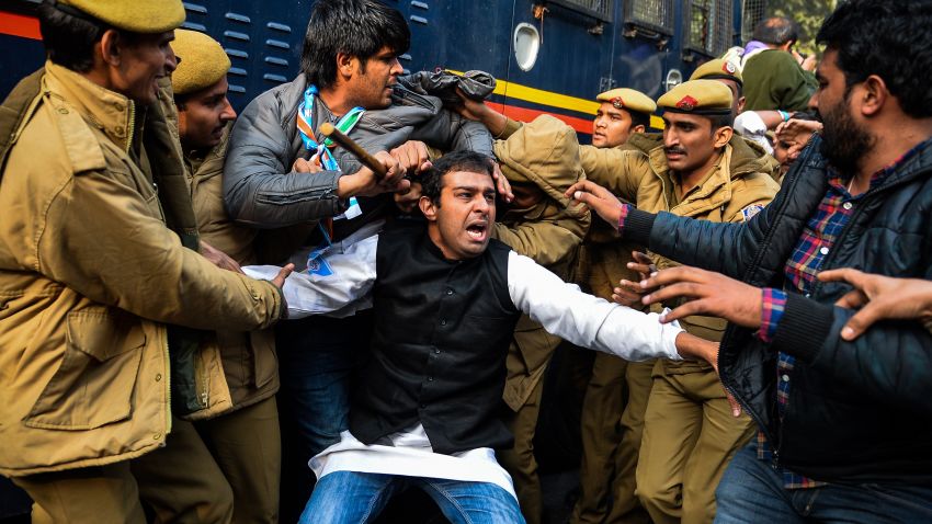 Indian police detain National Students Union of India (NSUI) students during a protest, after a student found was dead at a university hostel, in New Delhi on January 22, 2016. Rohit Vemula, a 26-year-old doctoral student at the university of Hyderabad, was found hanged on January 17, triggering protests in the southern city and New Delhi. He was one of five students, all from India's lowest Dalit social caste, to be suspended by the university after they were accused of assaulting the head of a right-wing student political group -- a charge they denied. AFP PHOTO / Chandan KHANNA / AFP / Chandan KhannaChandan Khanna/AFP/Getty Images