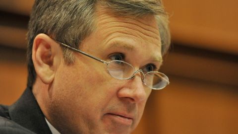Sen. Mark Kirk (R-IL) questions a group of nuclear experts at a public forum on the safety of Illinois nuclear power plants on March 25, 2011 in Chicago, Illinois. 