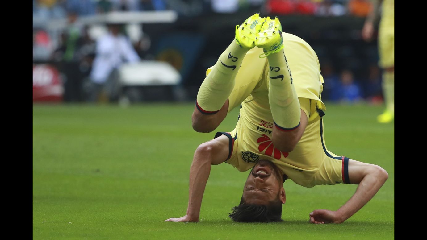 Club America's Oribe Peralta falls down Saturday, February 20, during a league match against Cruz Azul in Mexico City.