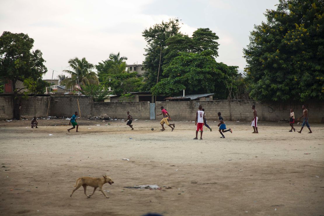 Children play soccer in a dirt lot in Ouanaminthe, Haiti.