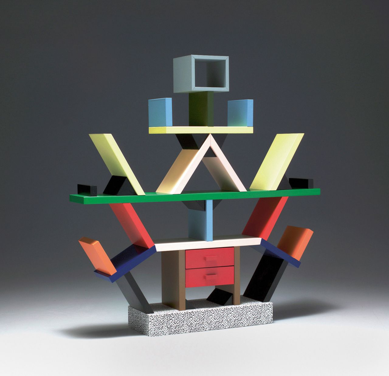 <em>By Ettore Sottsass for Memphis, 1981</em>  <br />From Italy via mid-century USA, this attention-grabbing shelving unit epitomizes Postmodern design and the Memphis style, the radical design collective Sottsass founded in 1981.