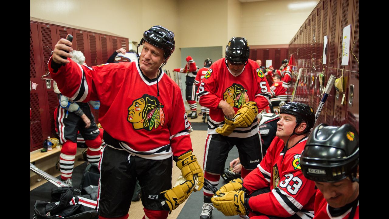 Former hockey star Jeremy Roenick takes a locker-room selfie before an NHL alumni game in Minneapolis on Saturday, February 20.