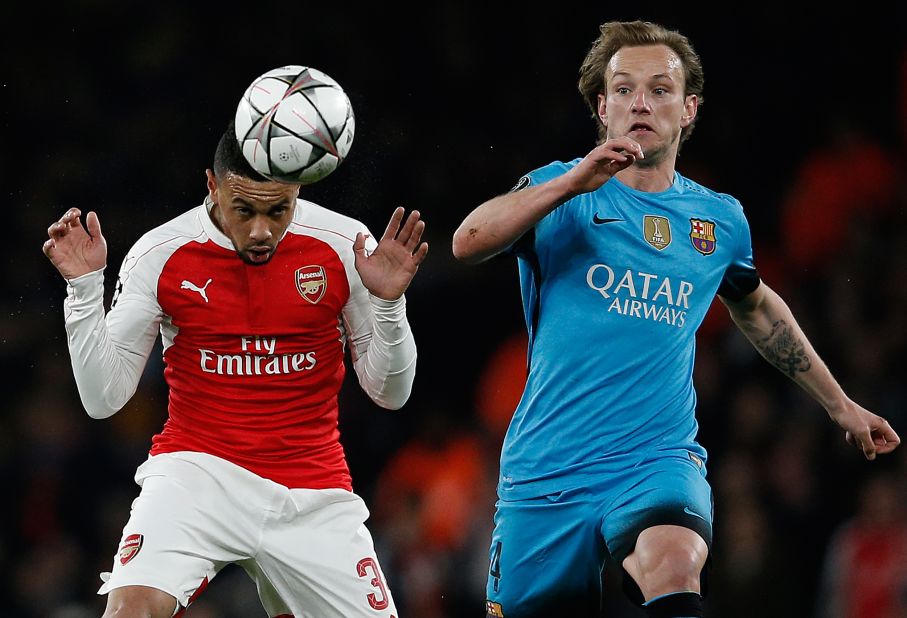Francis Coquelin was given the job of shielding the Arsenal defense against a Barcelona team which has been scoring goals for fun this season.