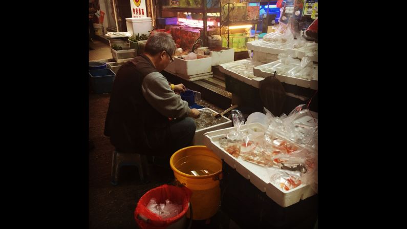 HONG KONG: "Goldfish seller bagging his wares in preparation for the evening rush hour. Goldfish have been around for about 1500 years and are considered to have been domesticated in the Song Dynasty around 1000 years ago. They are said to bring luck and so are very popular among Chinese people, who place great value on being lucky (who doesn't)." - CNN's Brad Olson <a href="index.php?page=&url=http%3A%2F%2Finstagram.com%2Fcnnbrad" target="_blank" target="_blank">@cnnbrad</a>.
