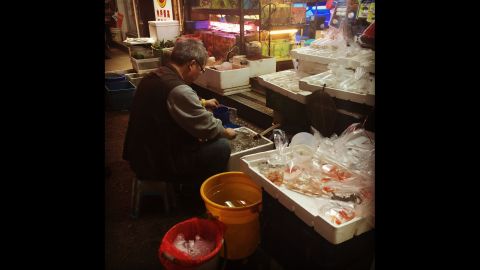 HONG KONG: "Goldfish seller bagging his wares in preparation for the evening rush hour. Goldfish have been around for about 1500 years and are considered to have been domesticated in the Song Dynasty around 1000 years ago. They are said to bring luck and so are very popular among Chinese people, who place great value on being lucky (who doesn't)." - CNN's Brad Olson <a href="http://instagram.com/cnnbrad" target="_blank" target="_blank">@cnnbrad</a>.