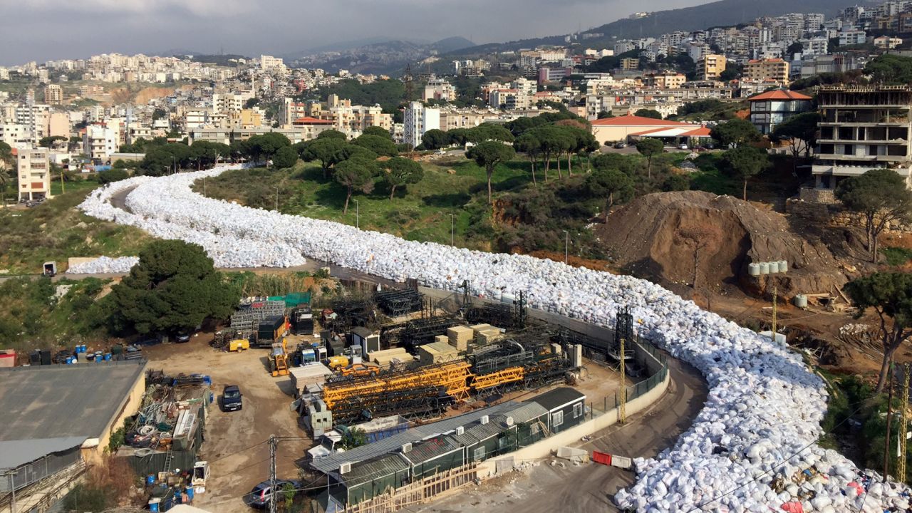 Piles of waste resemble a river of garbage in the Lebanese capital, Beirut, on Wednesday, February 24. Lebanon canceled a plan to export its waste to Russia, sending the country's ongoing waste crisis back to square one as mountains of trash choke the streets.