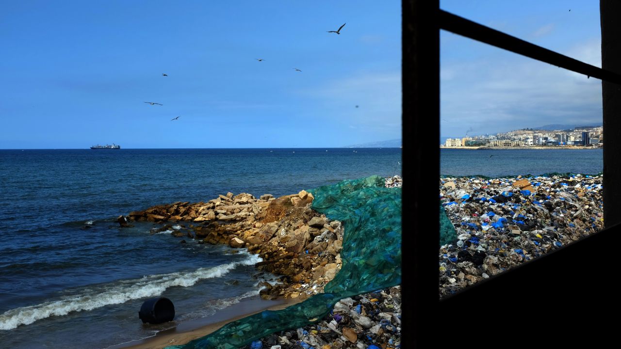 Garbage piles up at a temporary dump on a beach in Zalka, north of Beirut, on September 30.