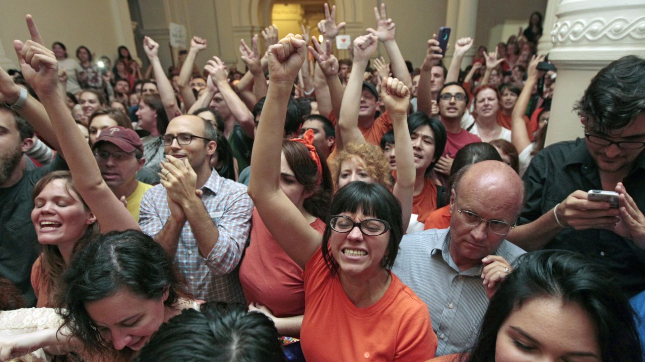 Abortion-rights advocates celebrate the defeat of the measure on June 25, 2013, the last day of that summer's first special legislative session. Davis' filibuster, combined with protests by supporters, helped defeat the legislation at midnight.
