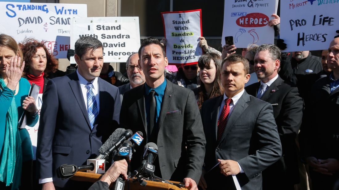 David Daleiden, the other defendant in the indictment over the videos, speaks to media and supporters after turning himself in the following day in Houston. Daleiden and Sandra Merritt are charged with tampering with a governmental record, a felony punishable by up to 20 years in prison. Both have pleaded not guilty.