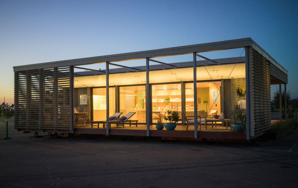<a href="http://surehouse.org/the-house/" target="_blank" target="_blank">Sure House</a> is the Stevens Institute of Technology's entry to the 2014 Solar Decathalon. The 1,000 sq ft beach house adopts a low-slung, 1960s Modernist form but applies cutting-edge materials and technology. The structure uses 90 percent less energy than conventional US homes and is fully solar powered. Flood shutters and fiber composite sheathing repurposed from retired boats ward off floodwaters. Thanks to off-grid solar energy storage, when the house is all bottled up during and after a storm, it can function as normal and even share its surplus with the neighborhood. The model may soon be replicated across vulnerable coastal communities.