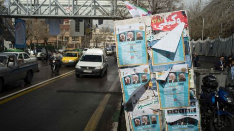 Campaign posters covered all kinds of surfaces in Tehran on Wednesday, the last day of campaigning. Some see the parliamentary vote as a referendum on President Hassan Rouhani and the nuclear deal he spearheaded.