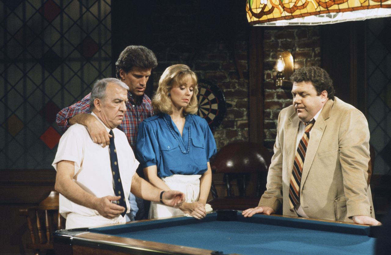 <strong>'Cheers': </strong>From 1982 to 1993, this sitcom -- set in a Boston bar -- offered viewers a community they could call their own. From left, Nicholas Colasanto played "Coach," Ted Danson played ex-baseball player Sam Malone, Shelley Long played Malone's romantic interest Diane Chambers, and George Wendt played lovable barfly Norm Peterson. Some "Cheers" characters -- like the know-it-all mailman, Cliff Clavin, unforgettably played by John Ratzenberger -- became so embraced by viewers that they entered almost mythical cultural status.