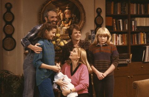 <strong>'Family Ties':</strong> America watched the liberal politics of the '60s and '70s give way to the Reagan '80s right before their eyes on this family sitcom. Young Republican Alex P. Keaton, played by Michael J. Fox, center, made constant fun of his liberal baby boomer parents. No matter what your politics were, it was hard not to laugh when Alex coaches his little brother to say he spent his summer vacation watching the Iran-Contra hearings.  