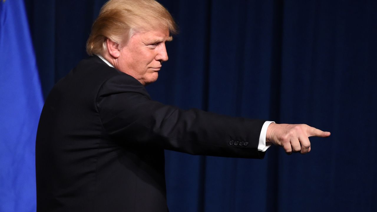 Republican presidential candidate Donald Trump points to supporters after speaking at a caucus night watch party at the Treasure Island Hotel & Casino on February 23, 2016 in Las Vegas, Nevada.
