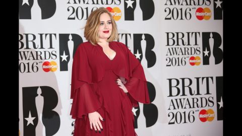 Adele poses for photographers at the 2016 Brit Awards in London on Wednesday, February 24.