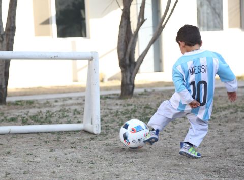 Murtaza emulates his hero as he scores a goal wearing the Argentina captain's shirt.